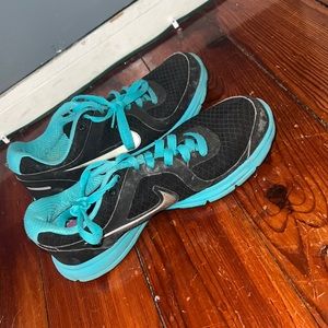 Blue and black Nikes